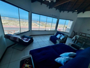 Moradas do Pier 2- apartamento a passos da areia, com vista perfeita da praia e plataforma em Tramandaí!